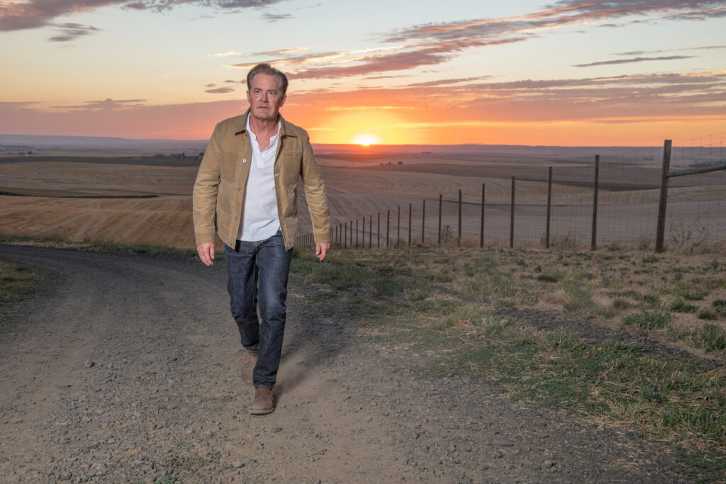 Kyle walking up country road